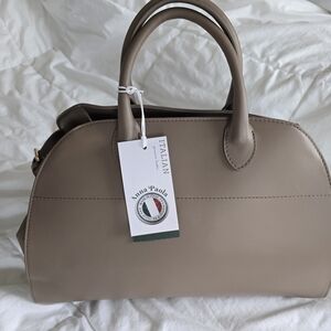 Tan Satchel with Structured Shape and Sturdy Handles